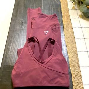 Gymshark set- berry color pants are medium and bra is small